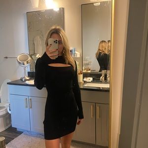Black knit body contouring Aritzia dress with cut out in perfect condition